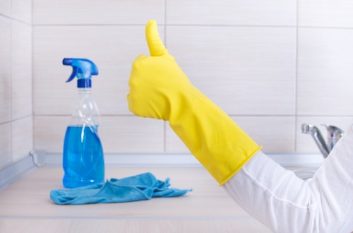 Local Surrey cleaning team working in a modern flat with access considerations