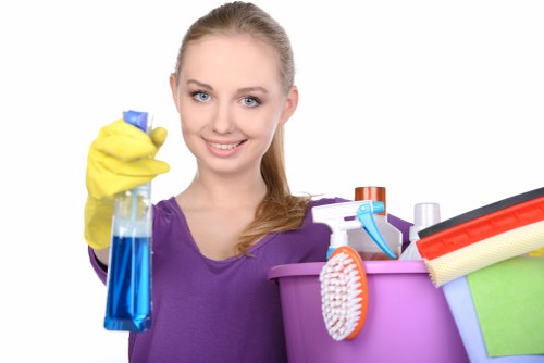 Local Surrey carpet cleaner treating stains on a hallway carpet