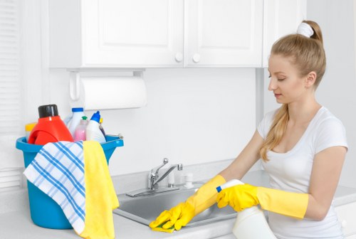 Professional cleaners handling a Surrey property with careful attention